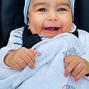 Jahred participe au concours pour gagner de l'argent avec cette photo : baby, smile, blanket, blue_hat, elephant_print, happy, child, infant, cute, hands, close_up, face, cheeks, clothing, car_seat, portrait, adorable, warm, baby_girl, baby_boy