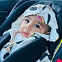 Jahred participe au concours pour gagner de l'argent avec cette photo : baby, child, car_seat, hoodie, clothing, seatbelt, car_interior, face, eyes, drool, cute, infant, portrait, person, seat, safety, young_child, window, daylight, expression