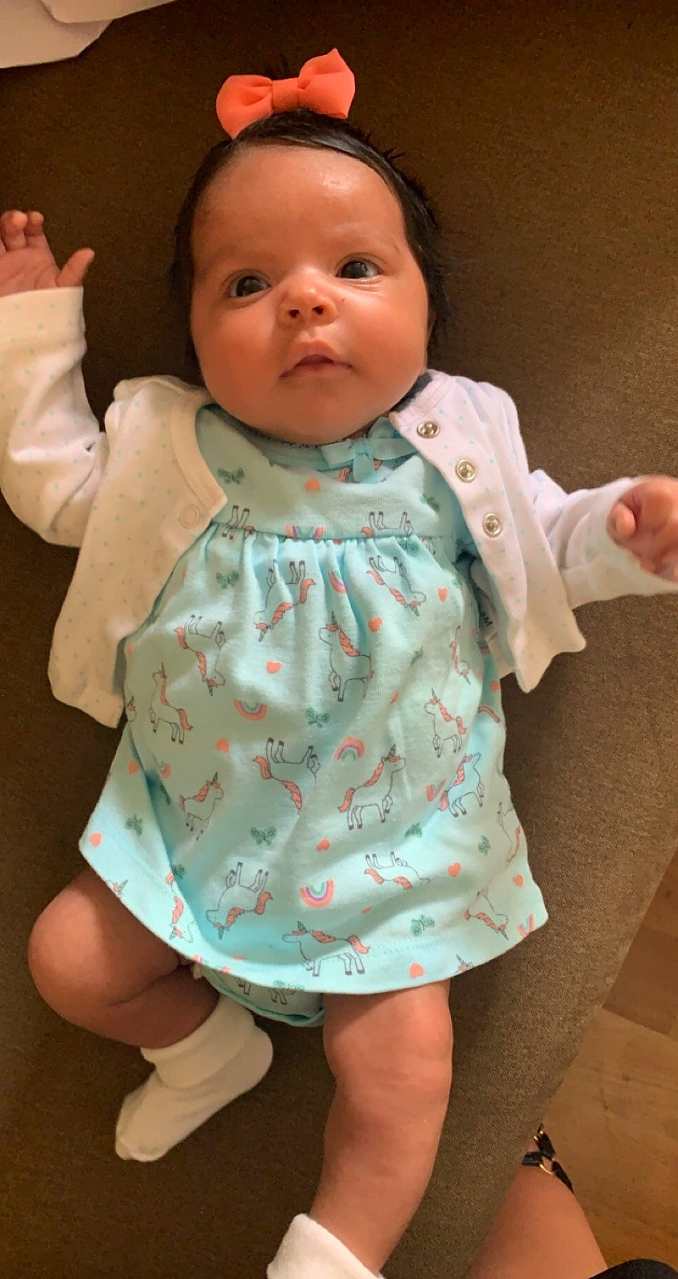 Aminah is registered to the contest to win money with this photo: baby, baby_toddler_clothing, cheek, child, dress, person, skin, sleeve, toddler