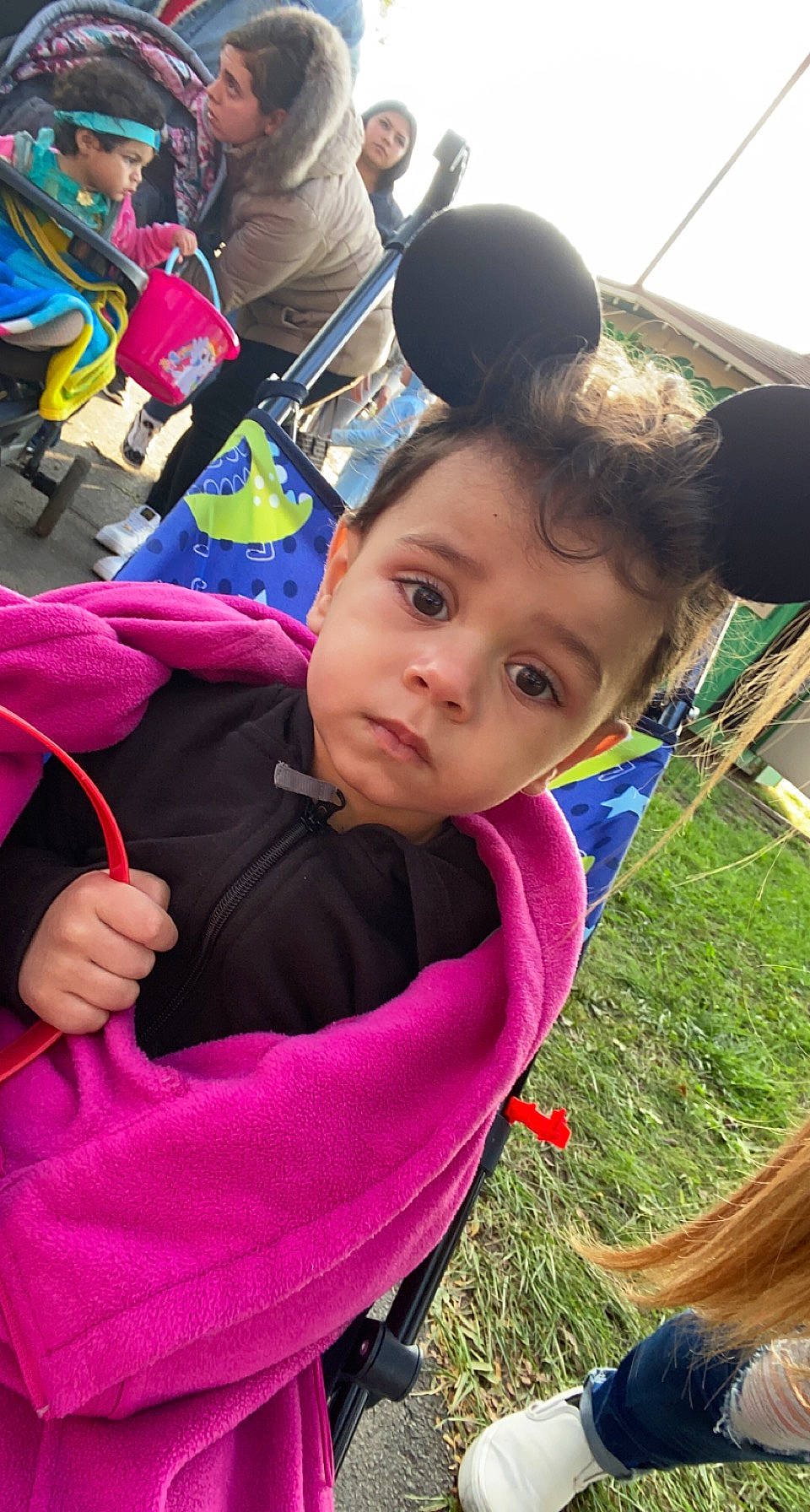 Aj is registered to the contest to win money with this photo: child, event, fun, grass, hairstyle, happy, headwear, human, leaf, leisure, magenta, mammal, person, plant, play, purple, recreation, spring, toddler, tradition