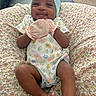 Xuri joined the competition — help win amazing prizes! baby, child, smile, headband, bow, mittens, floral_pattern, cushion, blanket, infant, cute, happy, indoors, person, clothing, skin, foot, legs, comfort, portrait