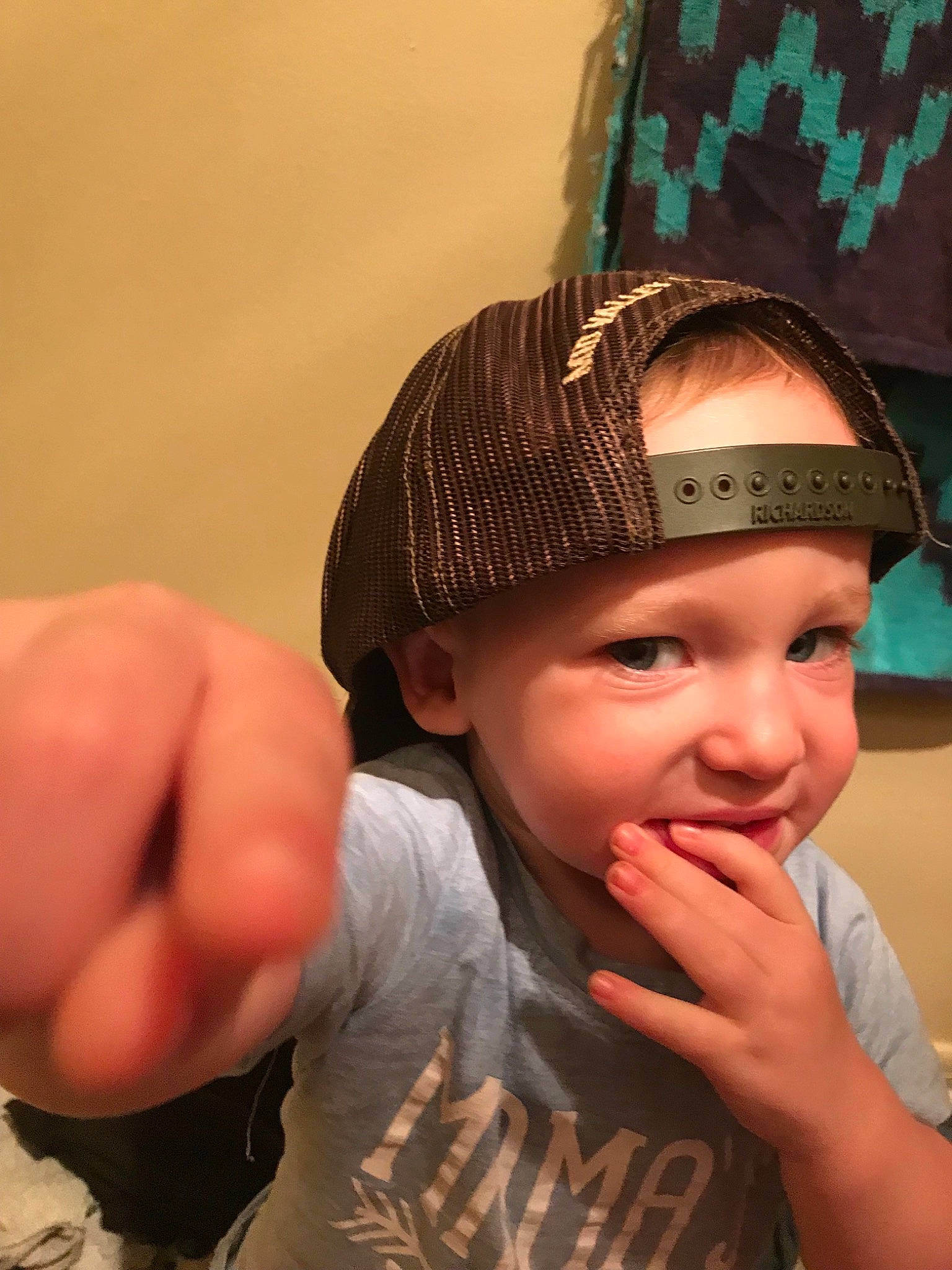 Jordan joined the competition — help win amazing prizes! cap, child, fashion_accessory, finger, gesture, hair_accessory, hat, headgear, joy, nail, person, thumb, toddler