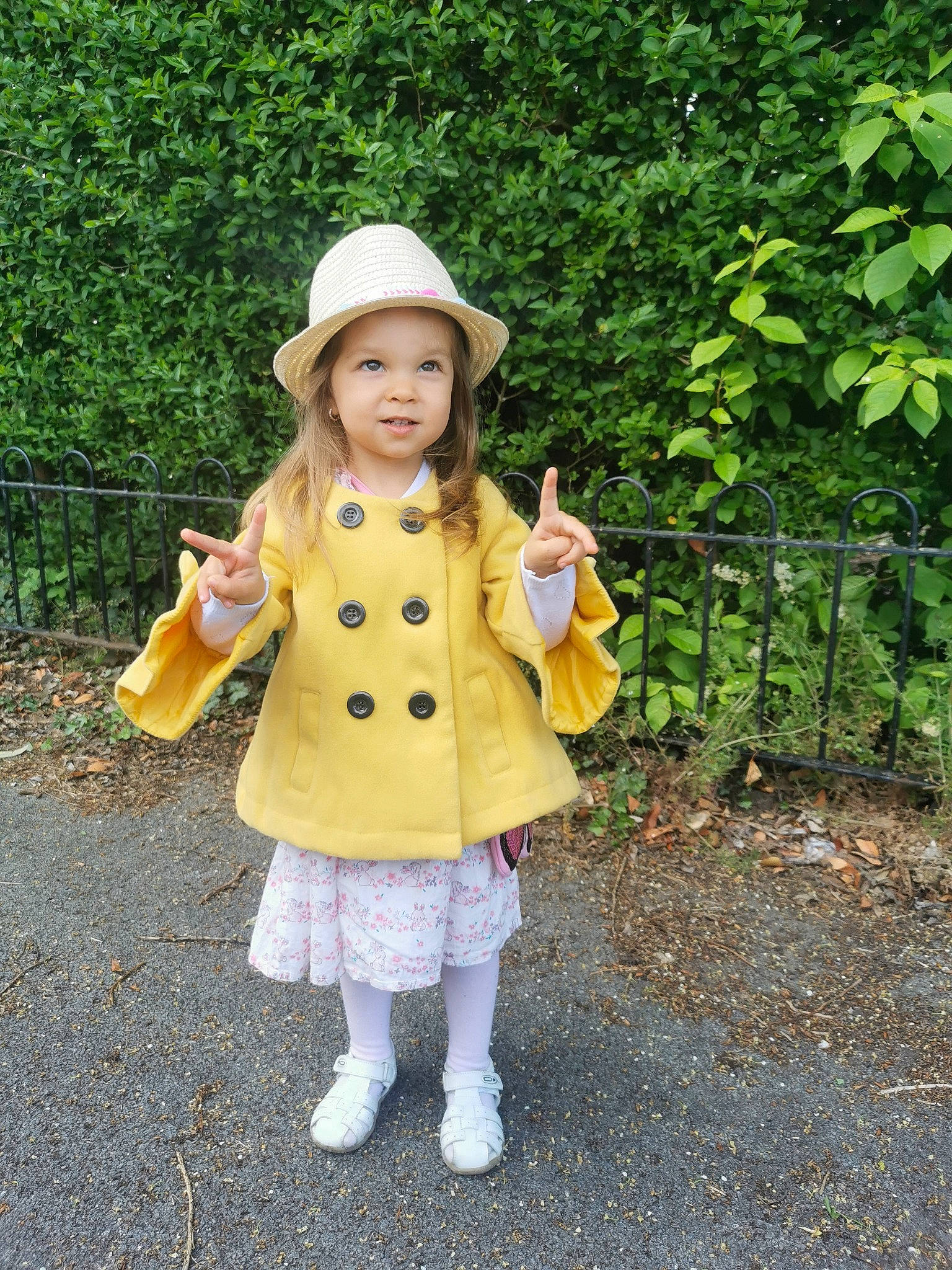 Eva joined the competition — help win amazing prizes! baby_toddler_clothing, boot, botany, child, clothing, costume_hat, fawn, fun, grass, hat, headgear, headwear, outerwear, pattern, people_in_nature, person, plant, sleeve, street_fashion, sun_hat