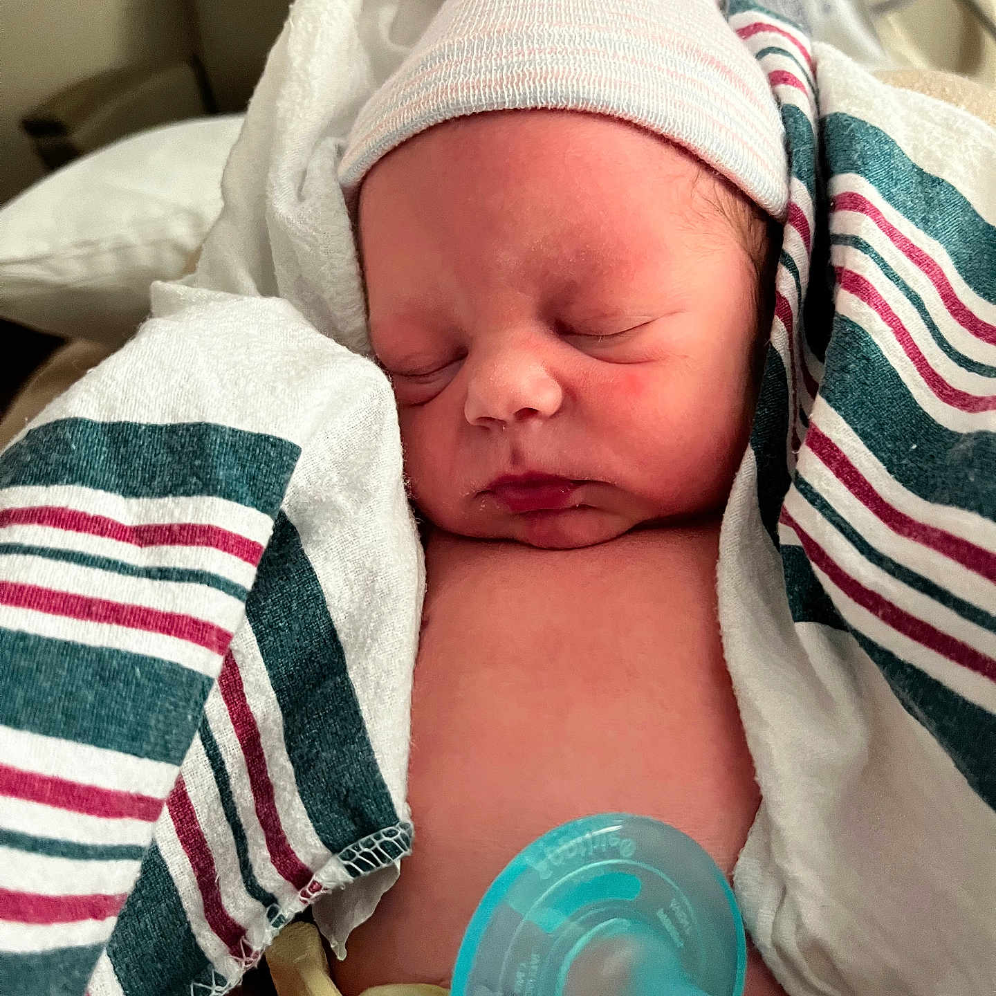 Grayson is registered to the contest to win money with this photo: baby, bed, blanket, cap, child, closeup, cute, face, healthcare, hospital, infant, newborn, pacifier, peaceful, person, rest, skin, sleeping, toddler, wrapped