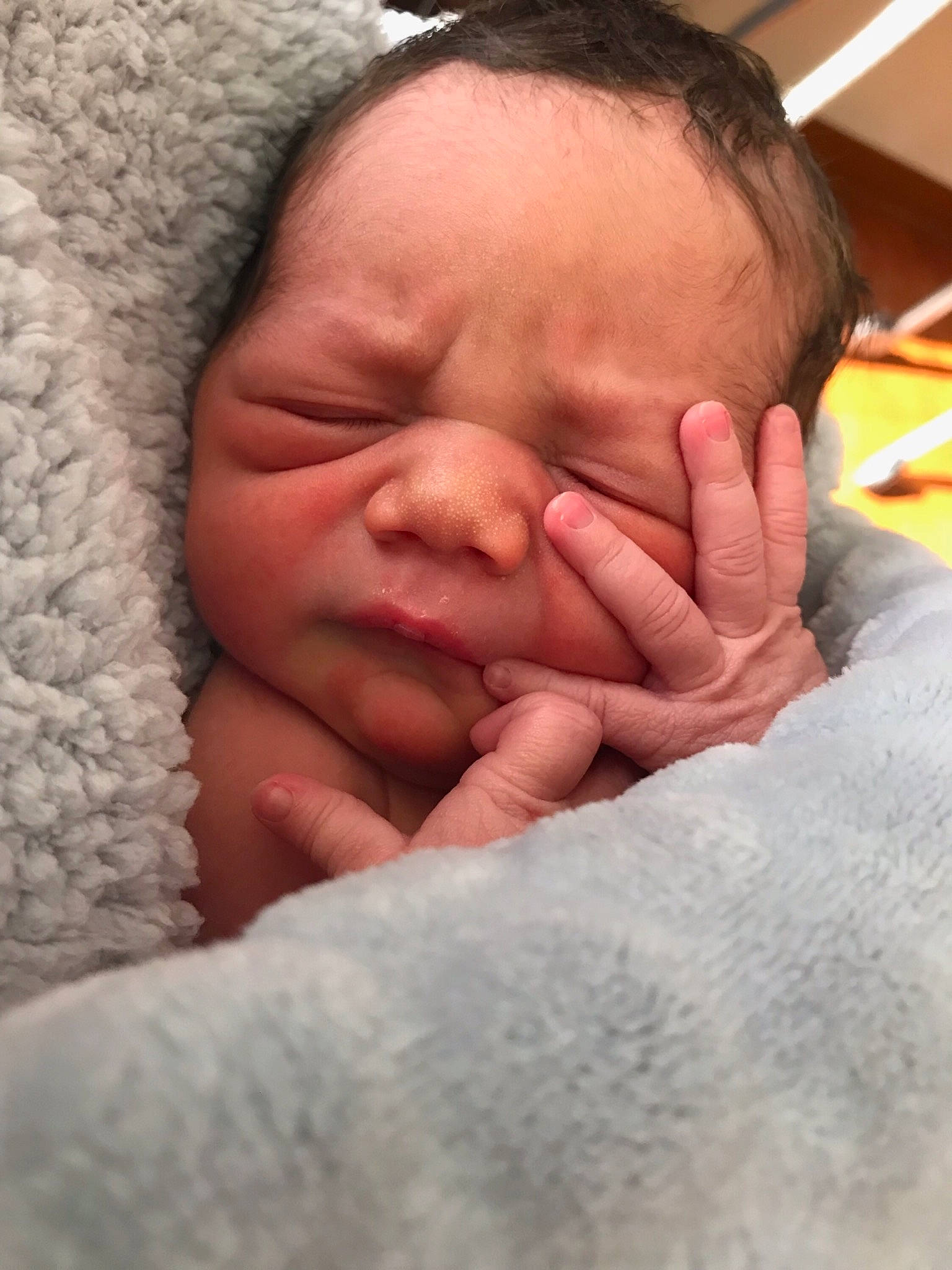 Lyle is registered to the contest to win money with this photo: baby, birth, cheek, child, close_up, face, finger, gesture, hand, lip, mouth, muscle, nail, nap, nose, person, skin, sleep, sorrow, thumb