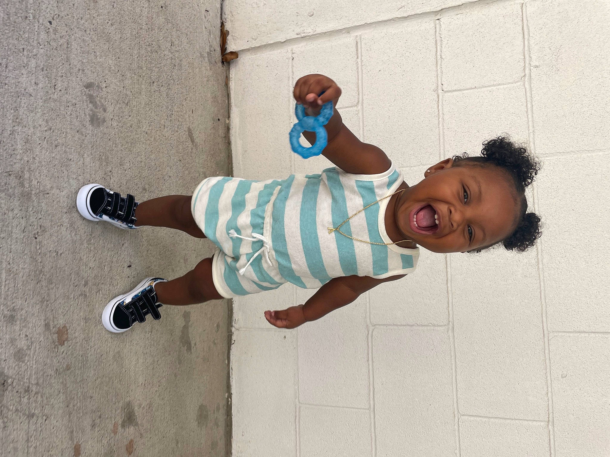 Aarian joined the competition — help win amazing prizes! art, calf, elbow, electric_blue, foot, happy, human_leg, knee, leg, outdoor_shoe, pattern, person, sleeve, smile, street_fashion, thigh, toddler, waist, walking_shoe, wall