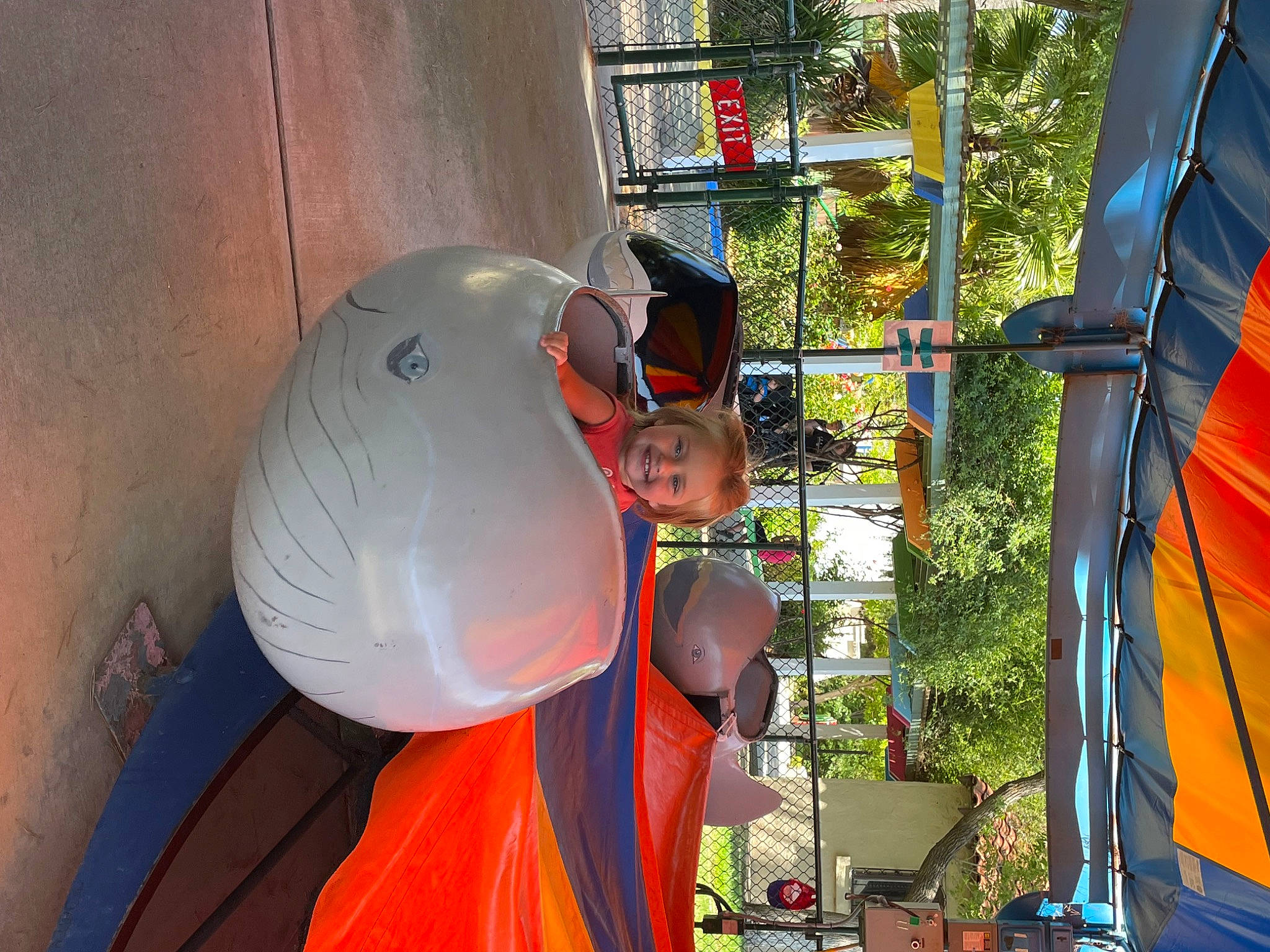 Josie joined the competition — help win amazing prizes! amusement_ride, child, event, eyewear, festival, fun, hat, helmet, joy, leisure, orange, person, personal_protective_equipment, public_event, recreation, t_shirt, toddler, tree, vacation