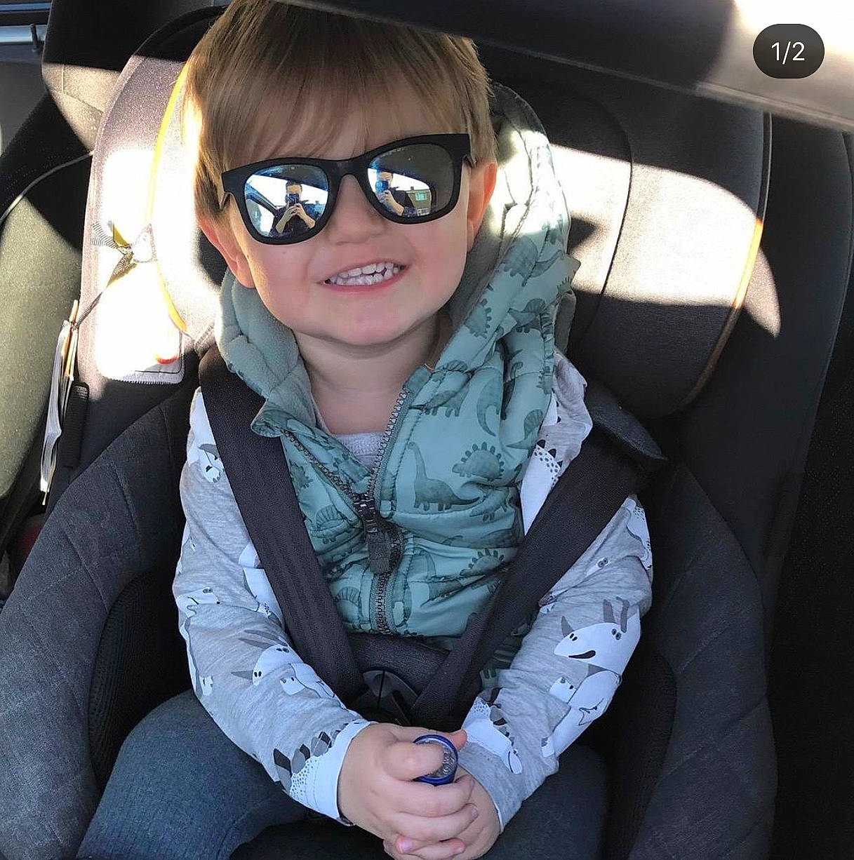 Edison is registered to the contest to win money with this photo: automotive_design, automotive_exterior, beauty, black_hair, car_seat, car_seat_cover, comfort, eyewear, finger, glasses, goggles, happy, head_restraint, joy, person, personal_protective_equipment, sleeve, smile, steering_wheel, sunglasses