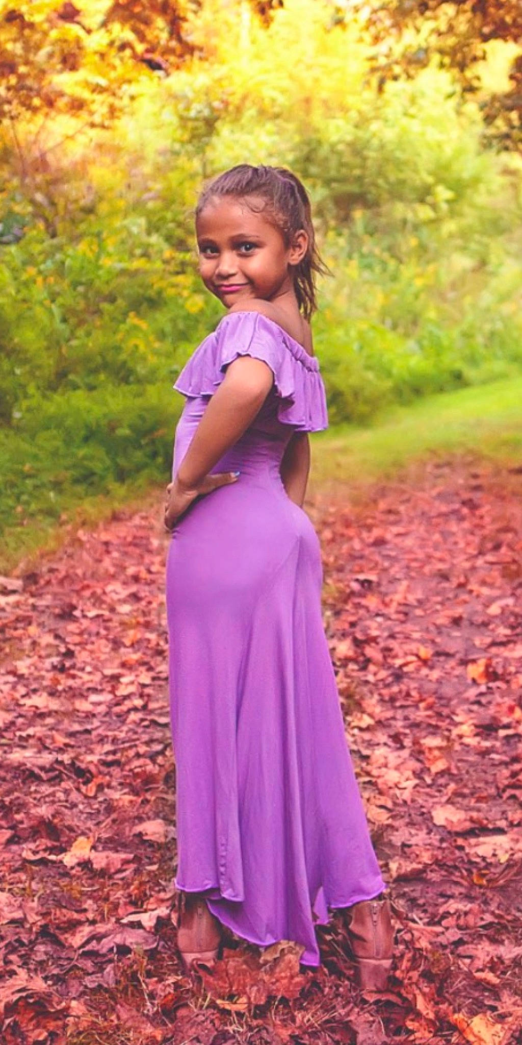 Zoie is registered to the contest to win money with this photo: child, child_model, clothing, dress, formal_wear, joy, lavender, lilac, magenta, pattern, person, purple, shoulder, smile, textile, toddler, violet