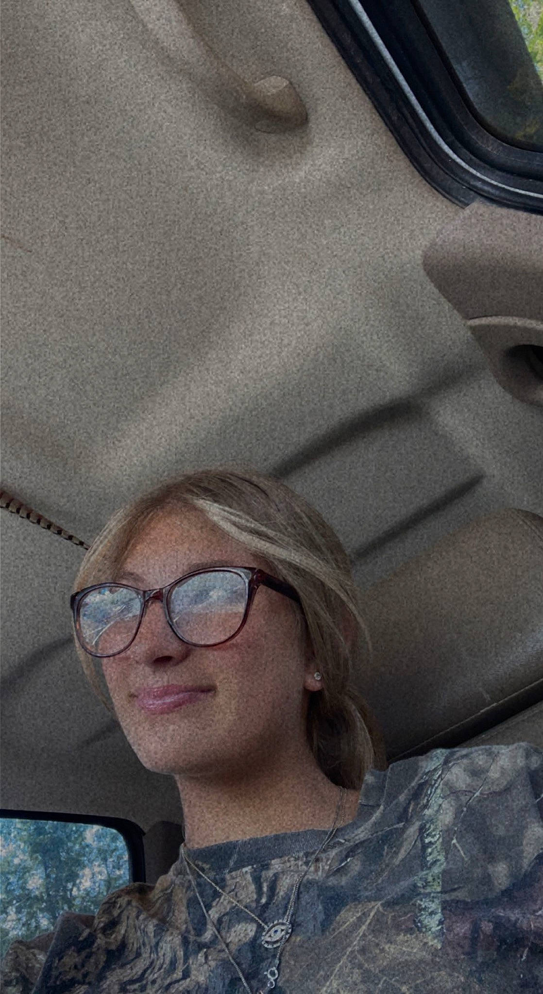 Lexi is registered to the contest to win money with this photo: auto_part, automotive_design, automotive_exterior, automotive_tire, automotive_window_part, car, car_seat, eyewear, family_car, glasses, grey, hat, joy, person, personal_luxury_car, rim, smile, sunglasses, tints_and_shades, vehicle_door