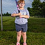 accessories, baseball, baseballbat, boy, child, clothing, footwear, glasses, grass, male, people, person, plant, racket, shoe, shorts, sneaker, sport, tennis, tennisracket
