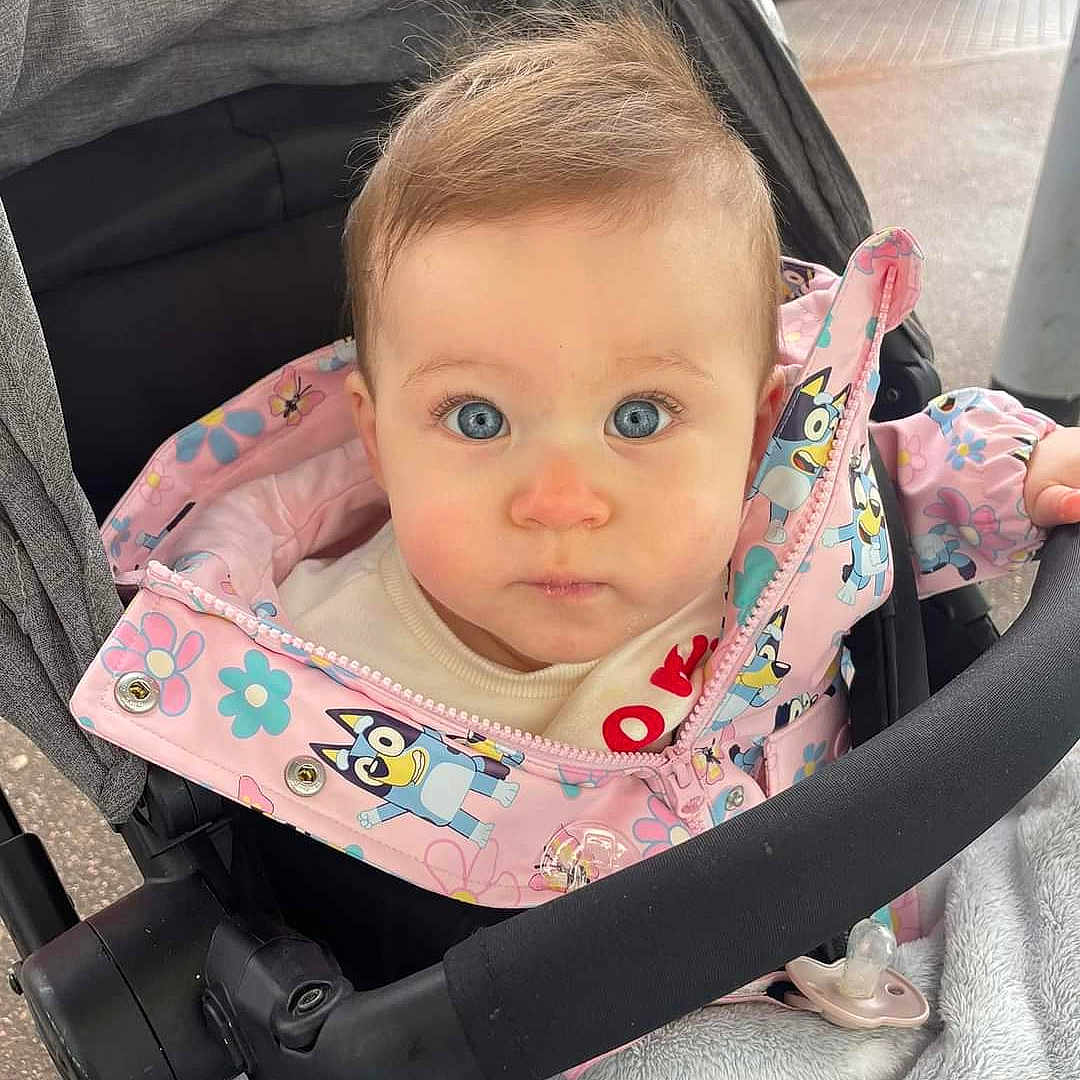 Lily joined the competition — help win amazing prizes! accessories, baby, car, car_interior, carseat, clothing, coat, face, hair, head, jacket, person, photography, portrait, shopping, strap, stroller, sunglasses, transportation, vehicle