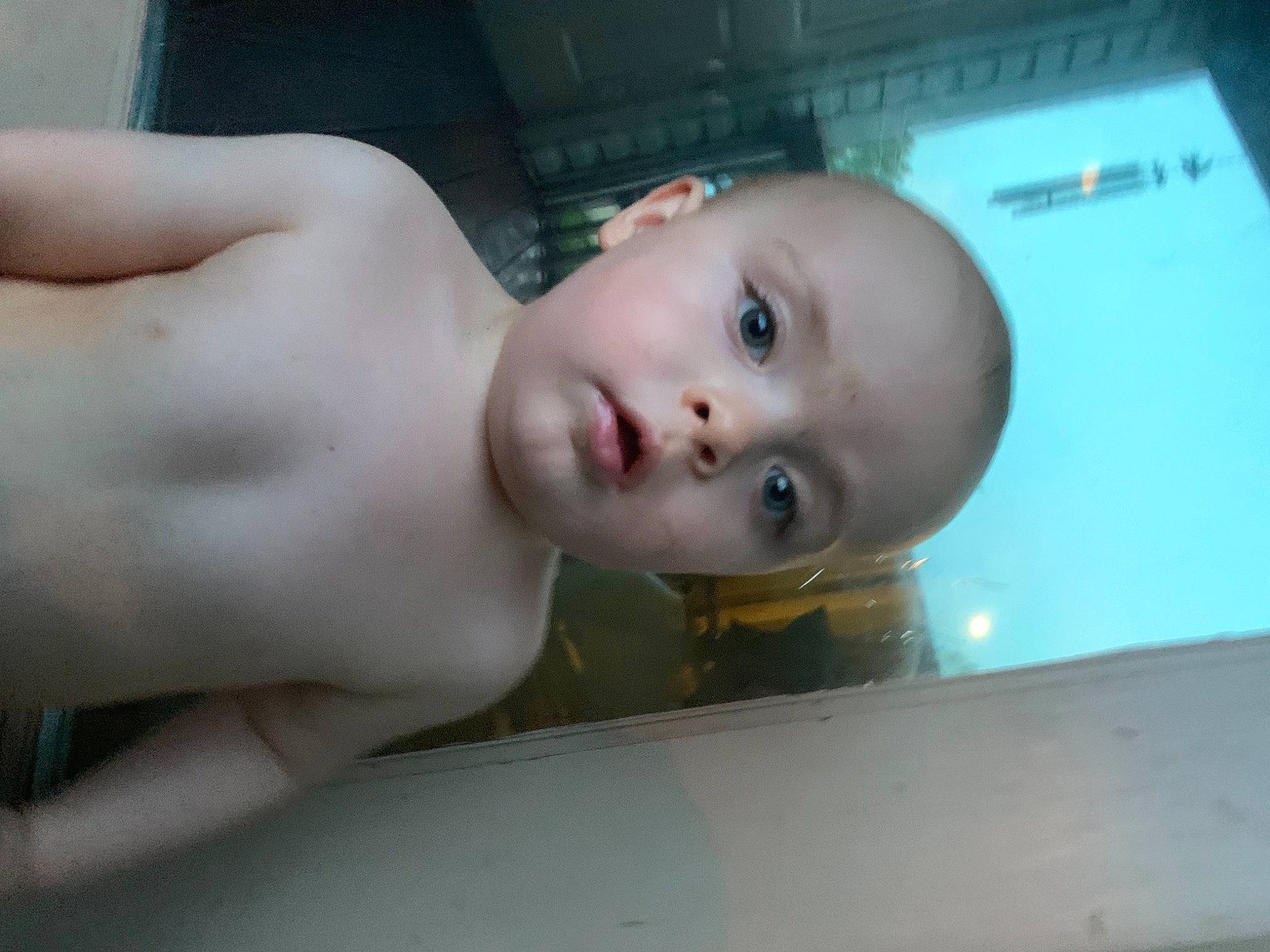 Caleb is registered to the contest to win money with this photo: baby, barechested, bathing, cheek, chest, child, eye, eyebrow, eyelash, flesh, fun, iris, jaw, lip, nose, person, rectangle, toddler, trunk