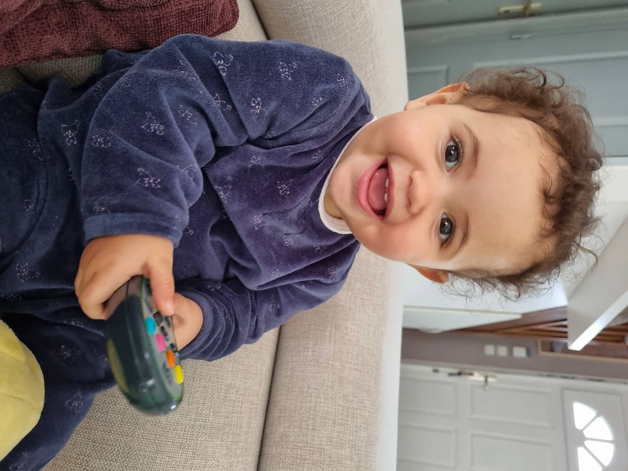 Niyah participe au concours pour gagner de l'argent avec cette photo : cabinetry, child, clothing, drawer, flooring, fun, happy, head, home_appliance, joy, kitchen, kitchen_appliance, mouth, nose, person, plastic_bottle, room, skin, smile, toddler