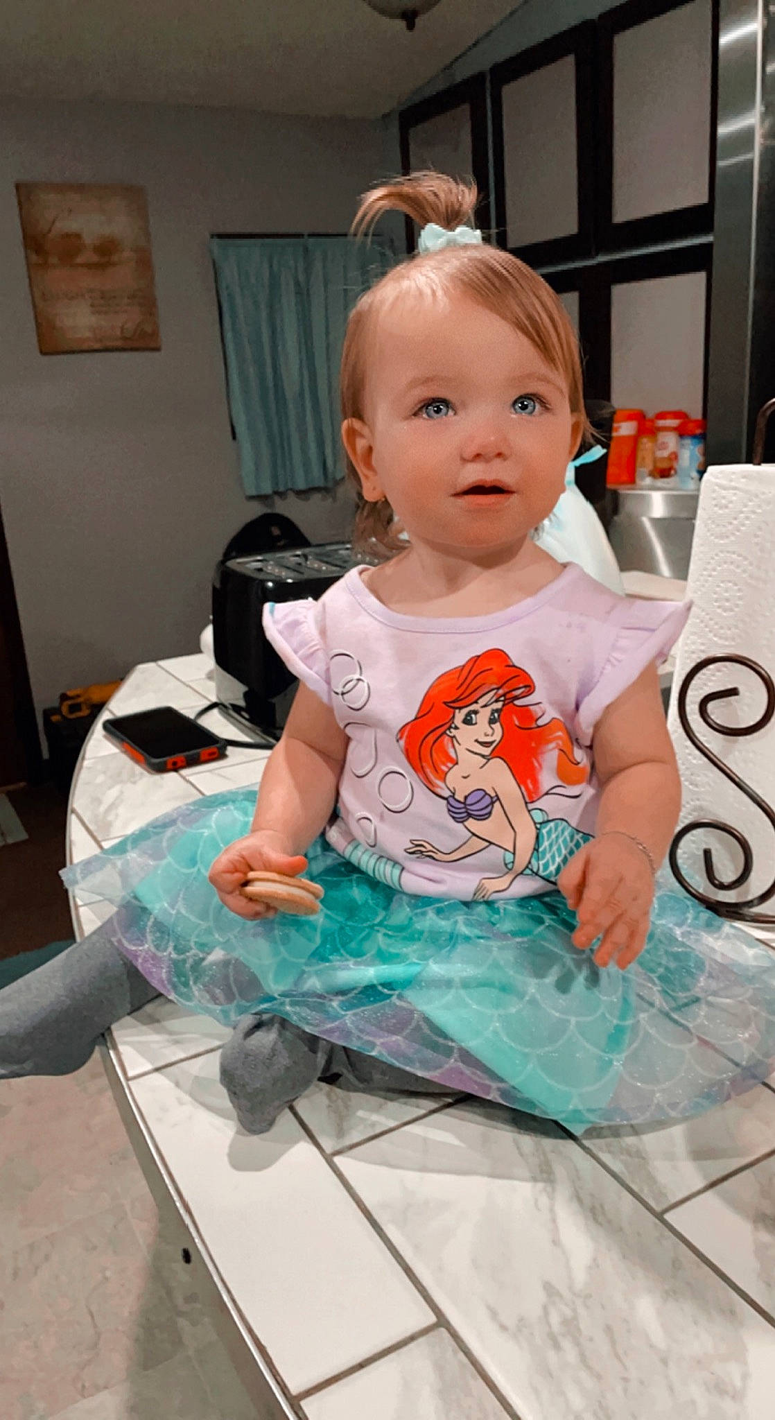 Isla is registered to the contest to win money with this photo: baby, baby_products, baby_toddler_clothing, cheek, child, curtain, eyelash, fun, happy, iris, paper_towel, person, picture_frame, pink, plastic, plastic_bag, room, sitting, smile, t_shirt