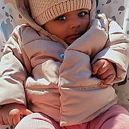 Mylee Millsaps joined the competition — help win amazing prizes! baby, child, puffy_jacket, knitted_hat, pom_pom, pink_pants, baby_seat, patterned_seat, outdoor, cold_weather, cute, portrait, infant, warm_clothing, small_hands, cozy, looking_at_camera, soft_texture, winter_wear, young_child