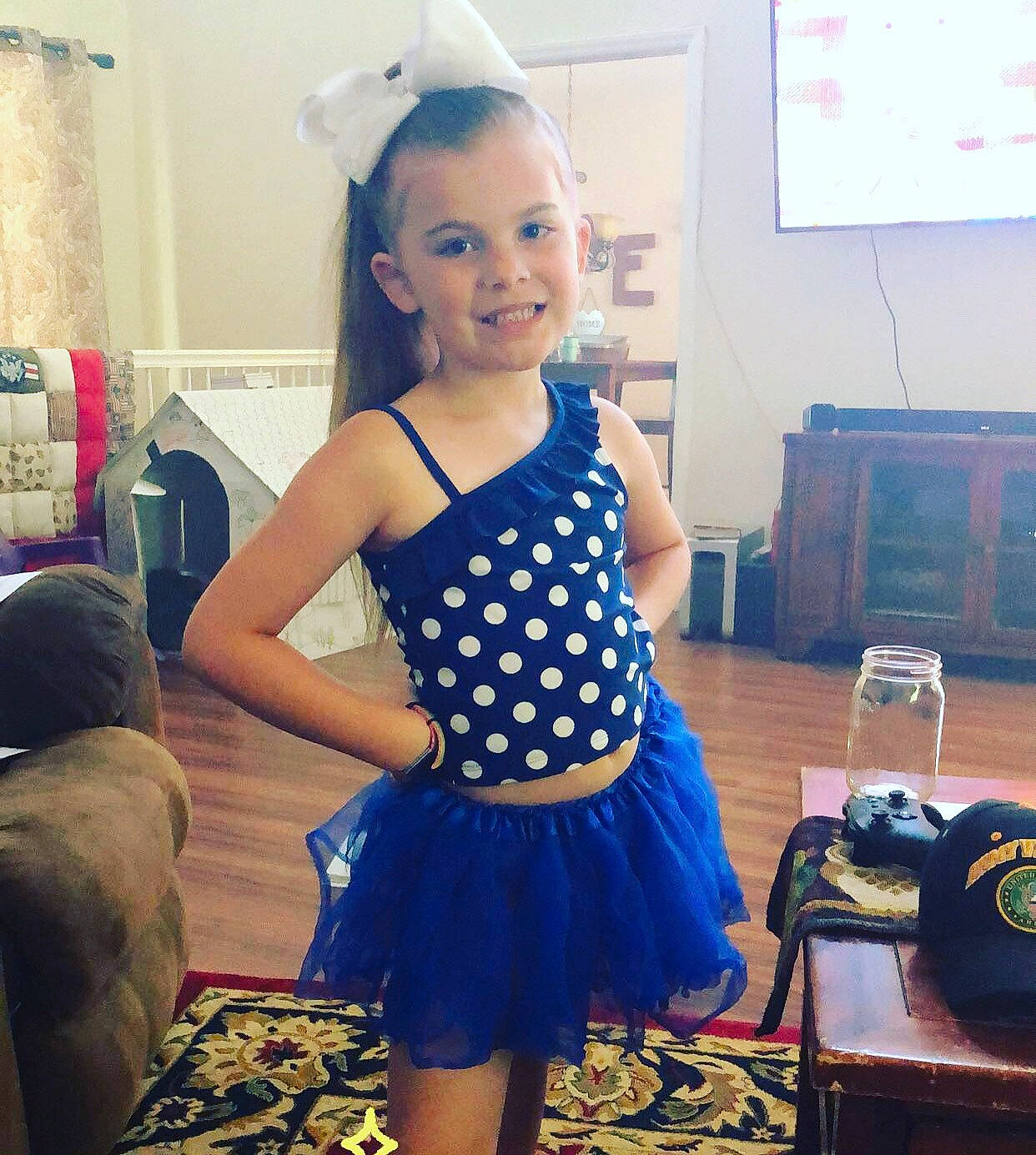 Kenley is registered to the contest to win money with this photo: baby_toddler_clothing, child, clothing, costume, design, dress, fashion_design, joy, pattern, person, polka_dot, toddler