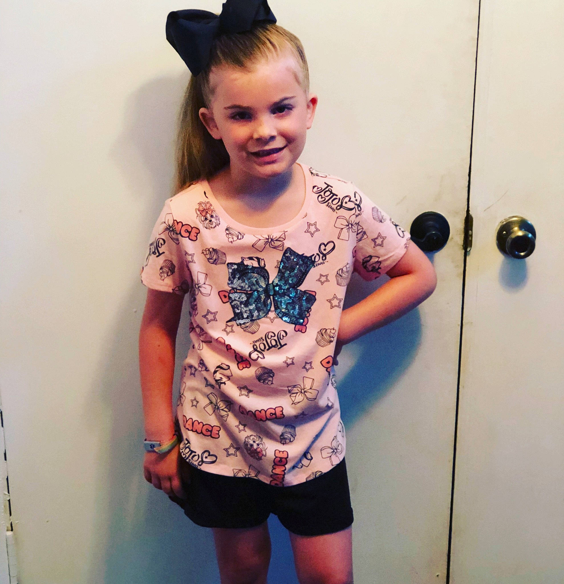 Kenley is registered to the contest to win money with this photo: arm, blond, clothing, cool, dress, eye, face, fashion, hair, hairstyle, head, joint, joy, leg, muscle, person, selfie, shoulder, sleeve, t_shirt