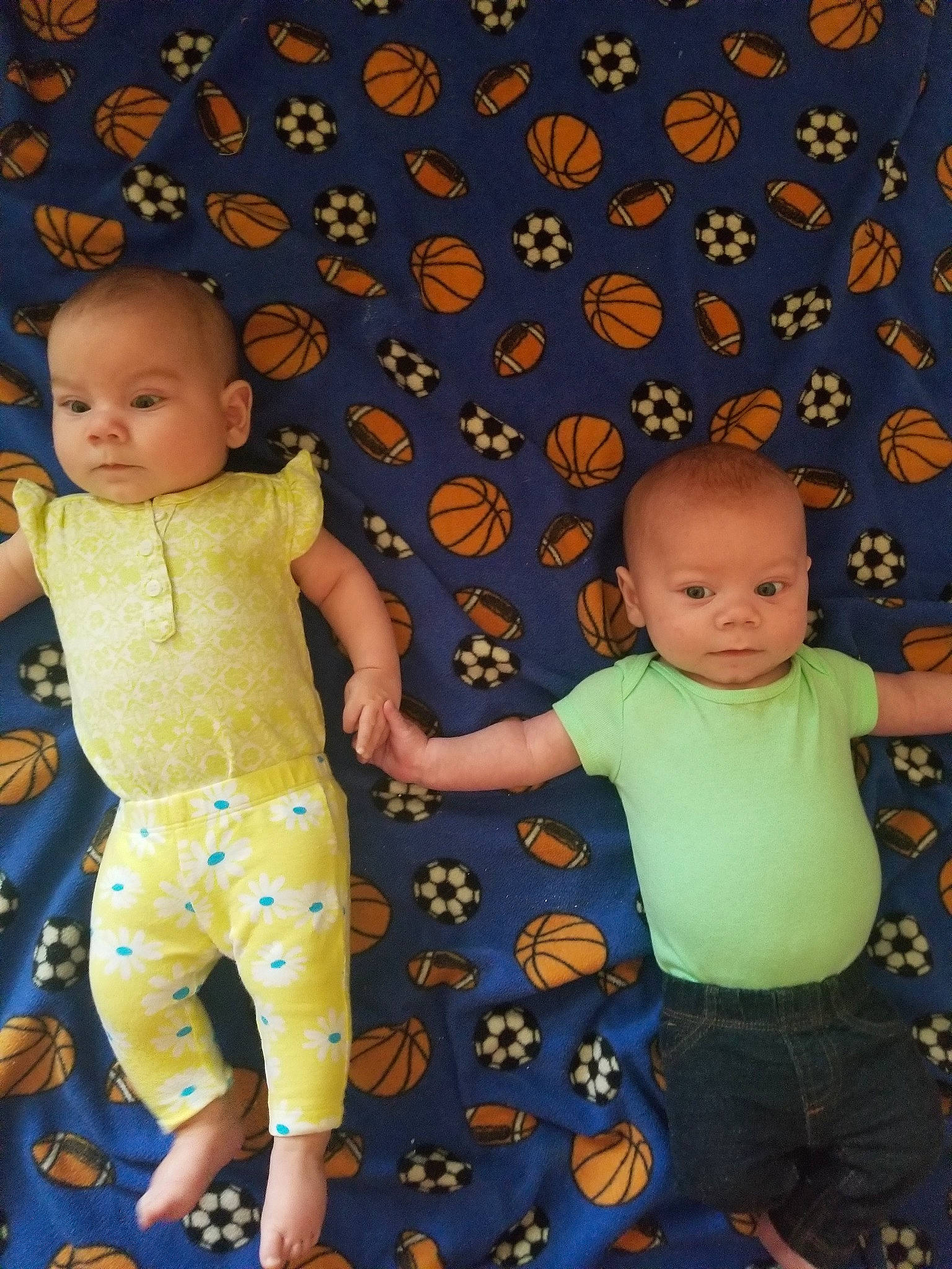 Atlas is registered to the contest to win money with this photo: baby, child, fun, leaf, pattern, person, play, sibling, smile, toddler, yellow