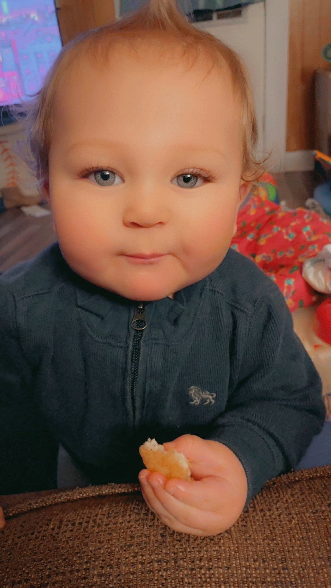 Zander Rawlings joined the competition — help win amazing prizes! baby, baby_toddler_clothing, cheek, child, eyelash, flooring, fun, gesture, happy, lip, mouth, nail, nose, organ, person, sitting, skin, sleeve, smile, thumb