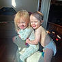 Riley joined the competition — help win amazing prizes! toddler, child, indoor, toy, plush, unicorn, pajamas, diaper, smile, happy, sunlight, floor, wooden_floor, playtime, candid, cute, fun, person, home, joy