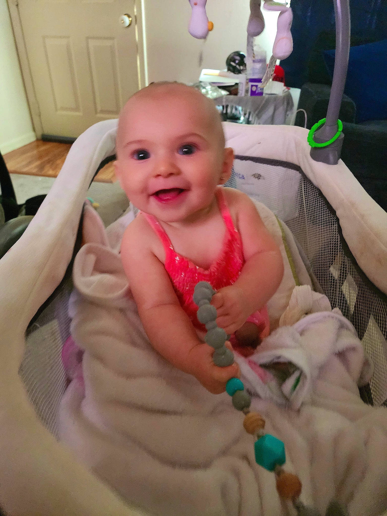 Amelianna is registered to the contest to win money with this photo: baby, cheek, chest, child, comfort, eye, finger, fun, gesture, happy, joy, mouth, nail, person, pink, product, room, sitting, skin, smile