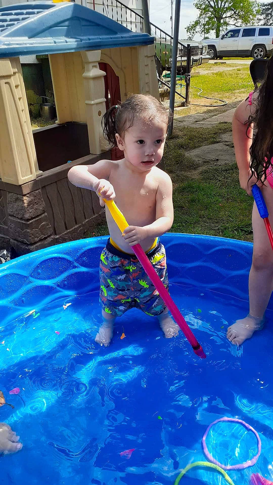 Atreus is registered to the contest to win money with this photo: barechested, barefoot, bathing, blue, child, electric_blue, fun, games, leisure, person, play, recreation, shorts, swimwear, thigh, tire, toddler, truck, vacation, water