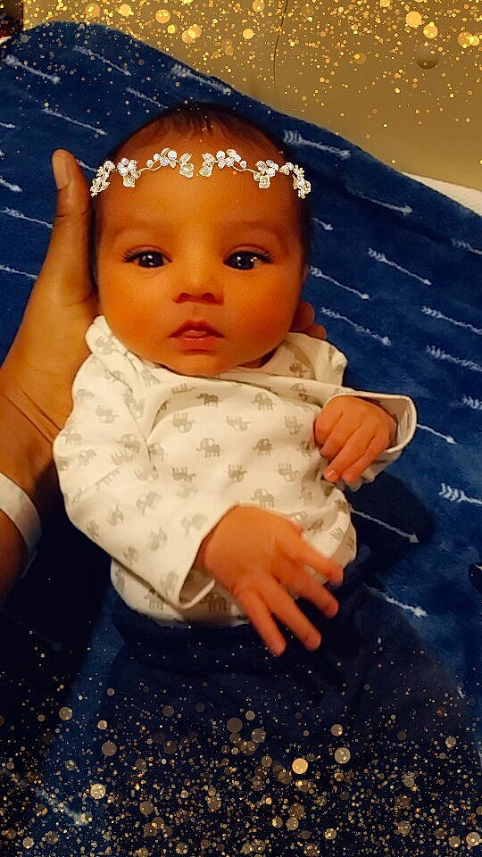 Maison joined the competition — help win amazing prizes! baby, cheek, child, doll, face, forehead, hair_accessory, hand, head, person, skin, toddler, toy