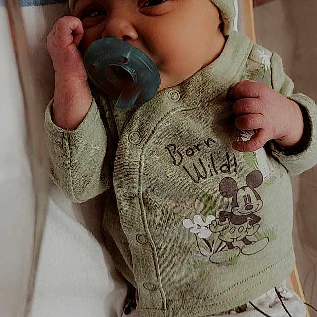 Zachary is registered to the contest to win money with this photo: baby, baby_toddler_clothing, beard, cap, cheek, comfort, cool, drinkware, ear, eyelash, face, happy, head, human_body, lip, nose, skin, sleeve, textile, toddler