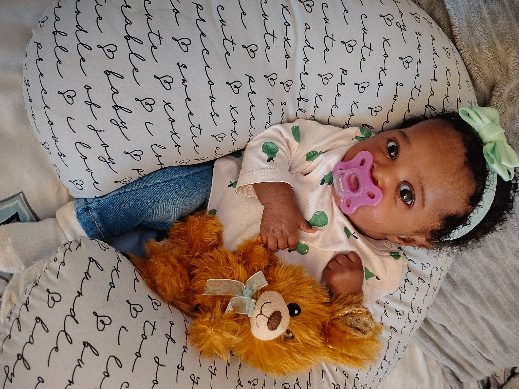 Nalani is registered to the contest to win money with this photo: baby, baby_products, baby_toddler_clothing, bedding, bedtime, cheek, child, comfort, eyelash, fur, happy, headgear, linens, pattern, person, product, room, smile, textile, toddler