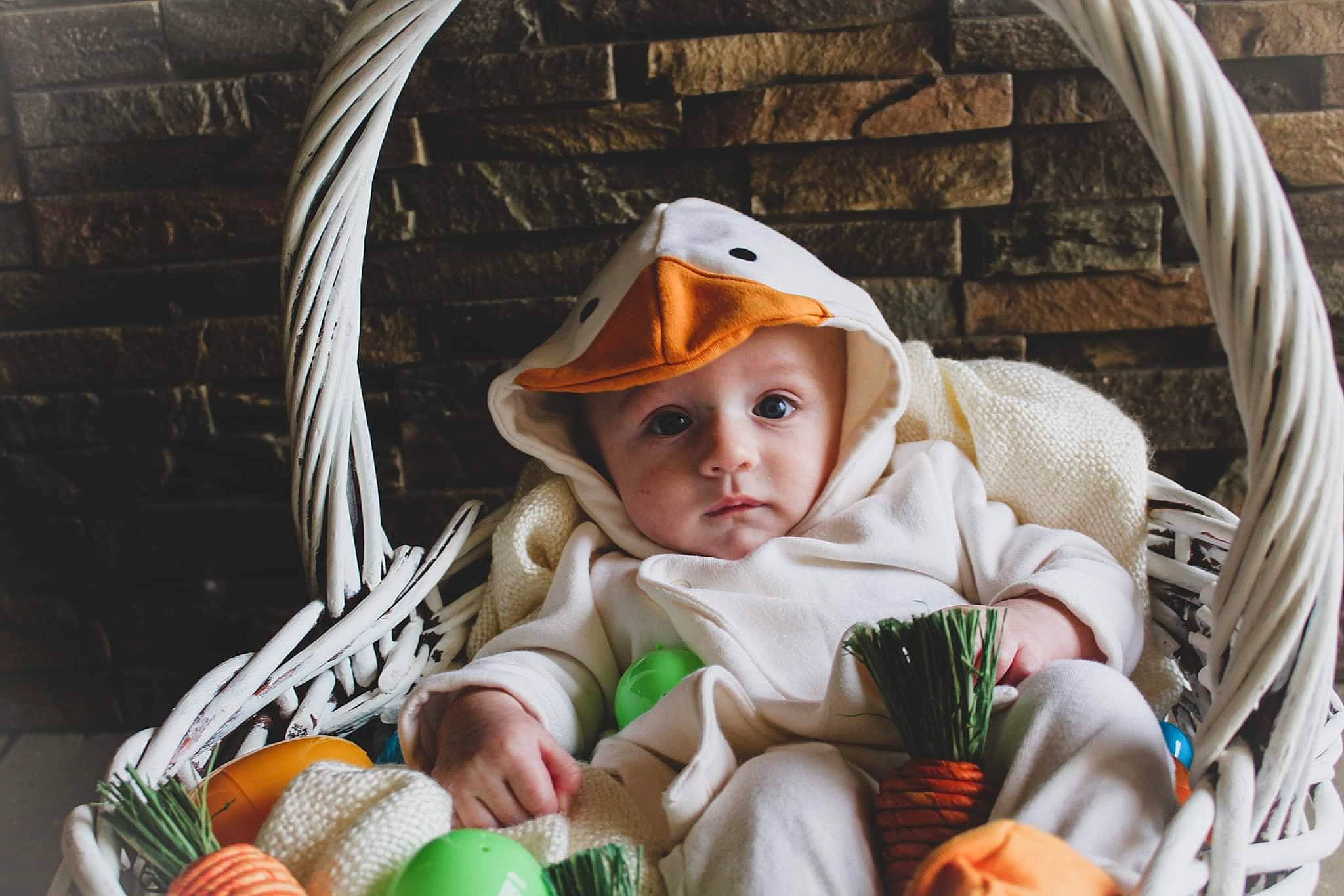 Rory joined the competition — help win amazing prizes! baby, baby_products, baby_toddler_clothing, cap, cheek, child, comfort, eye, fashion_accessory, grass, happy, head, headgear, headwear, iris, knit_cap, organ, person, sitting, toddler
