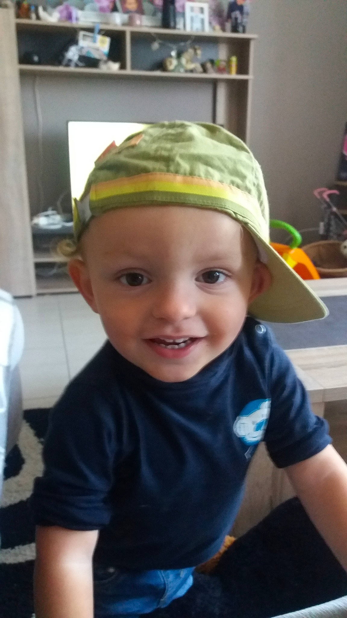 Emilien participe au concours pour gagner de l'argent avec cette photo : baby, cap, cheek, child, clothing, cool, fashion_accessory, forehead, hair_accessory, hat, head, headband, headgear, joy, person, smile, toddler