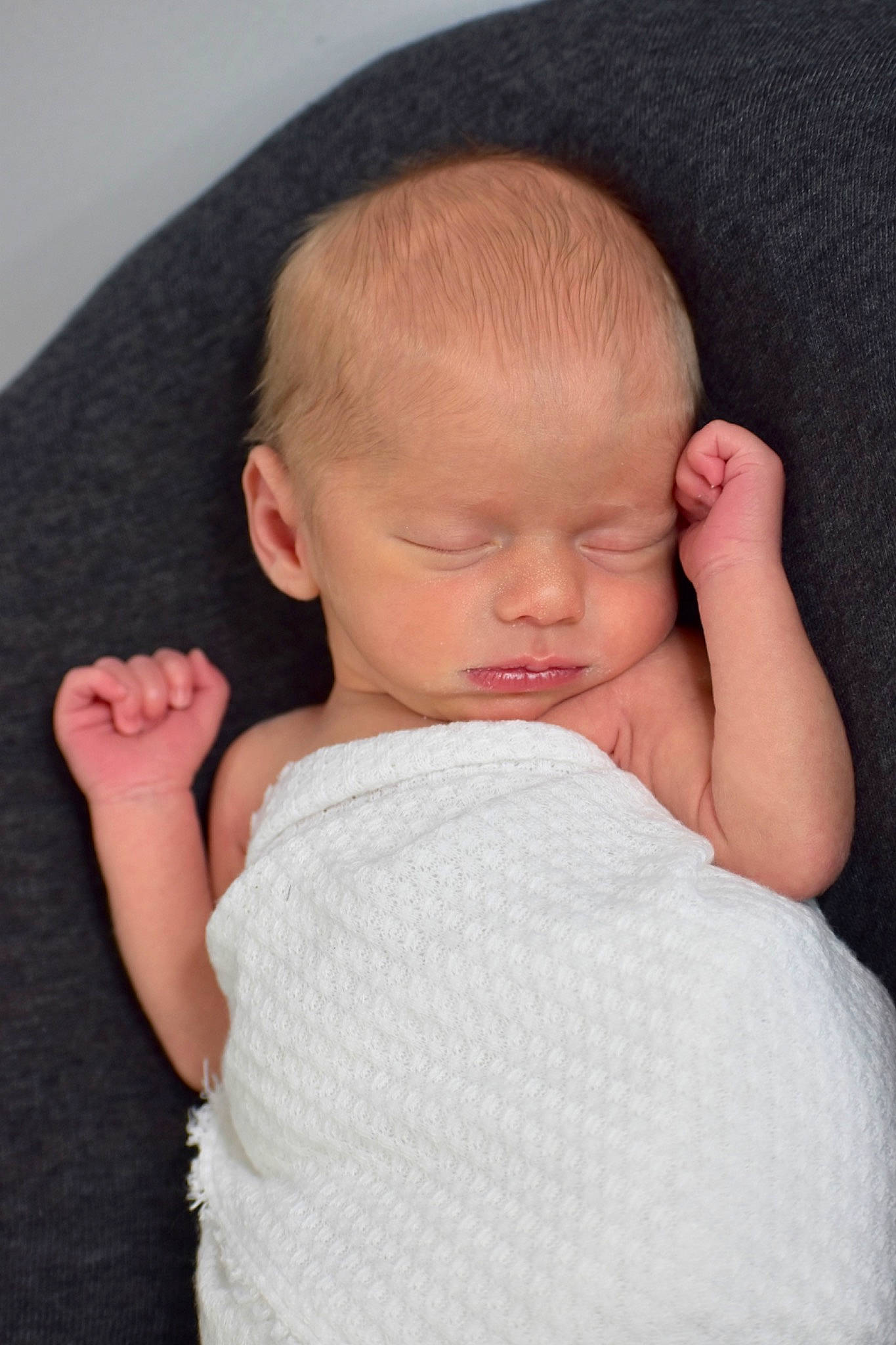 Damon is registered to the contest to win money with this photo: arm, baby, baby_toddler_clothing, cheek, chin, comfort, ear, eyebrow, finger, gesture, hairstyle, hand, joint, lip, neck, nose, person, shoulder, skin, sleeve