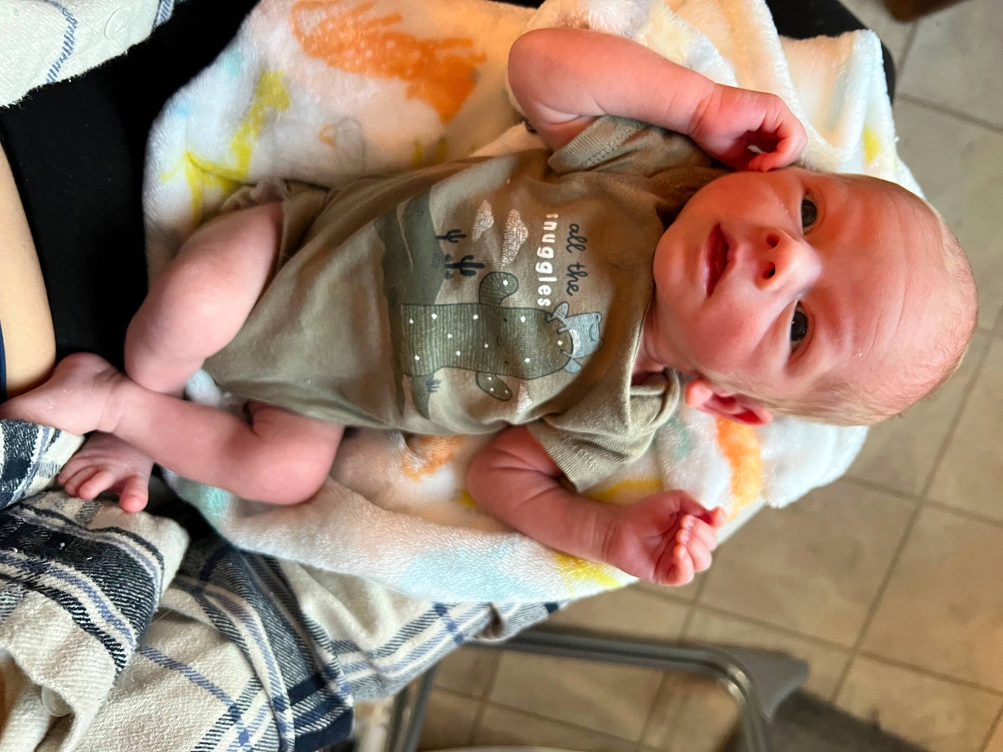 Deacon is registered to the contest to win money with this photo: abdomen, arm, baby, baby_products, baby_toddler_clothing, chest, child, comfort, elbow, finger, foot, gesture, hand, human_leg, mouth, nail, person, skin, thumb, toddler