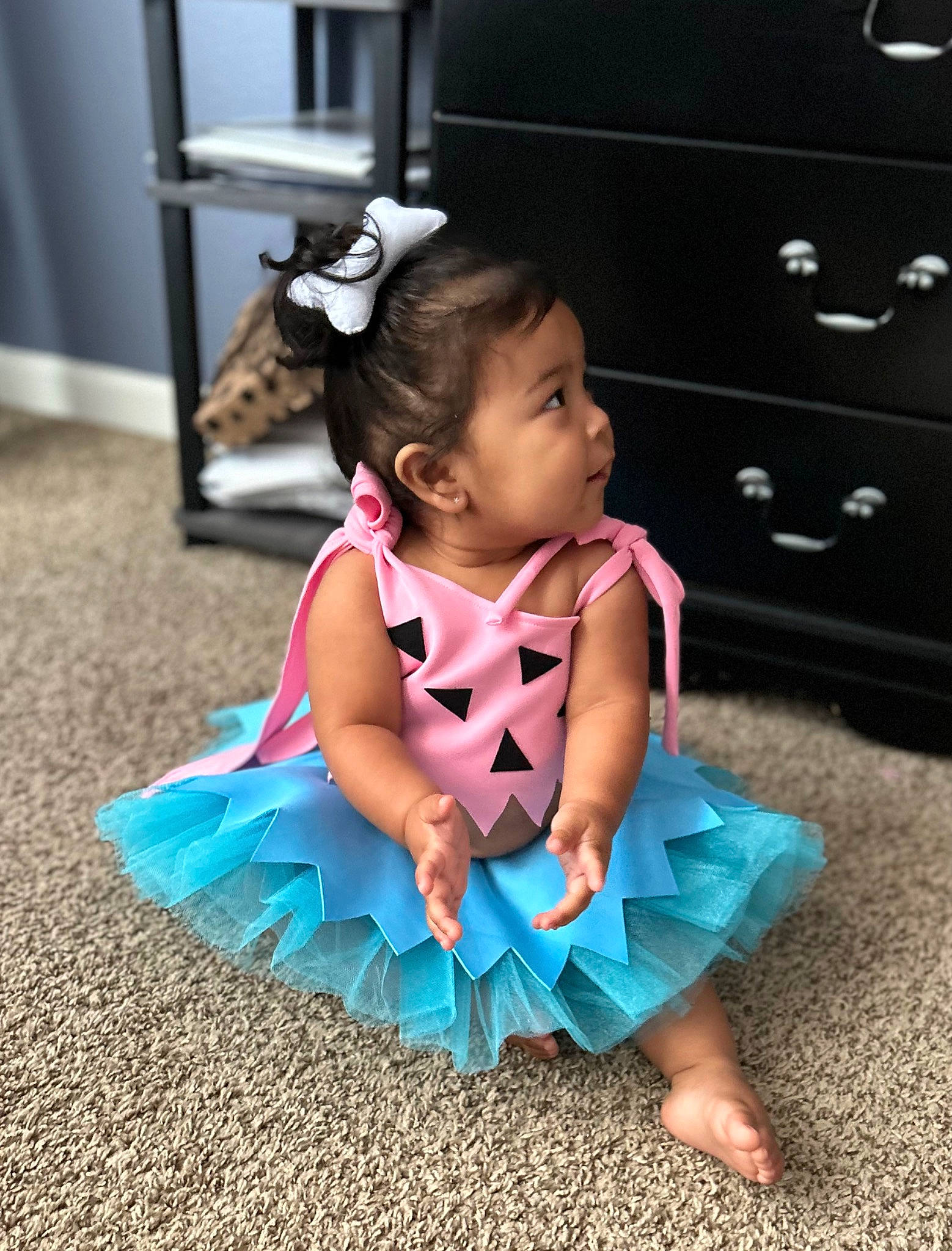 Samaria joined the competition — help win amazing prizes! baby, baby_toddler_clothing, cabinetry, chest_of_drawers, child, drawer, dress, eye, face, flooring, fun, hand, happy, head, human_body, magenta, pattern, person, purple, sleeve