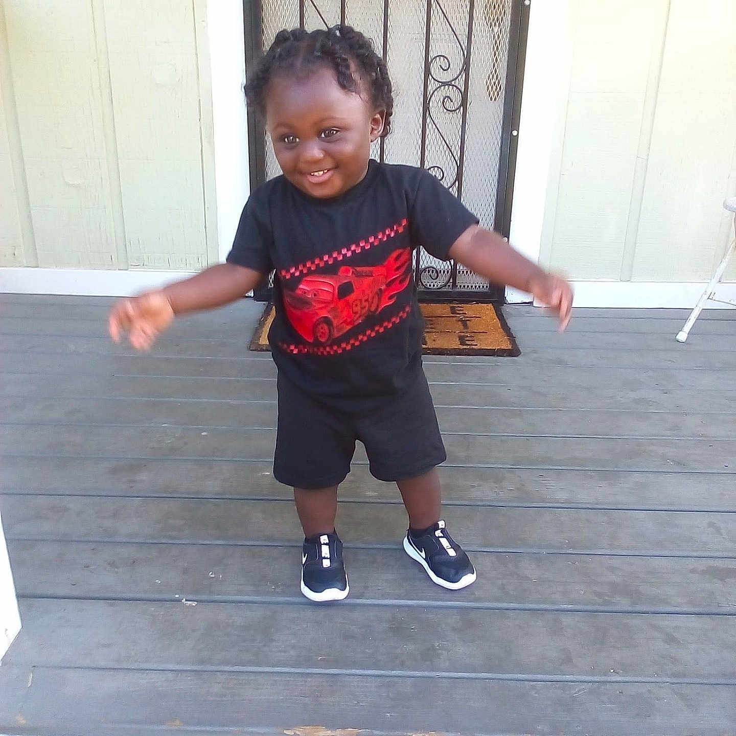 Armando joined the competition — help win amazing prizes! boy, child, clothing, door, face, footwear, head, male, mat, pants, person, photography, plant, portrait, pottedplant, shoe, shorts, sneaker, t_shirt, wood