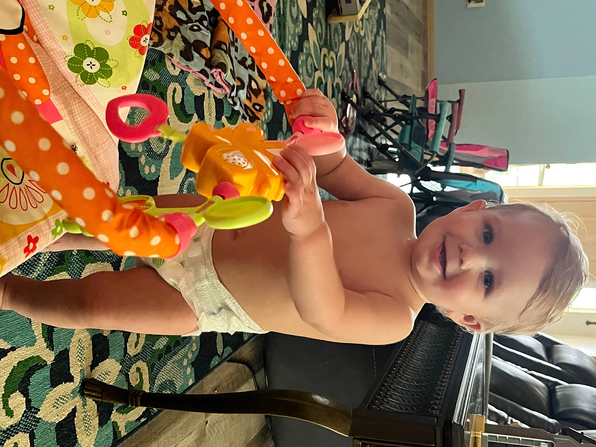 Ryatt is registered to the contest to win money with this photo: abdomen, arm, baby, chest, child, finger, fun, hand, human_body, human_leg, joy, leg, muscle, person, sandal, snapshot, swimwear, thigh, tire, toddler