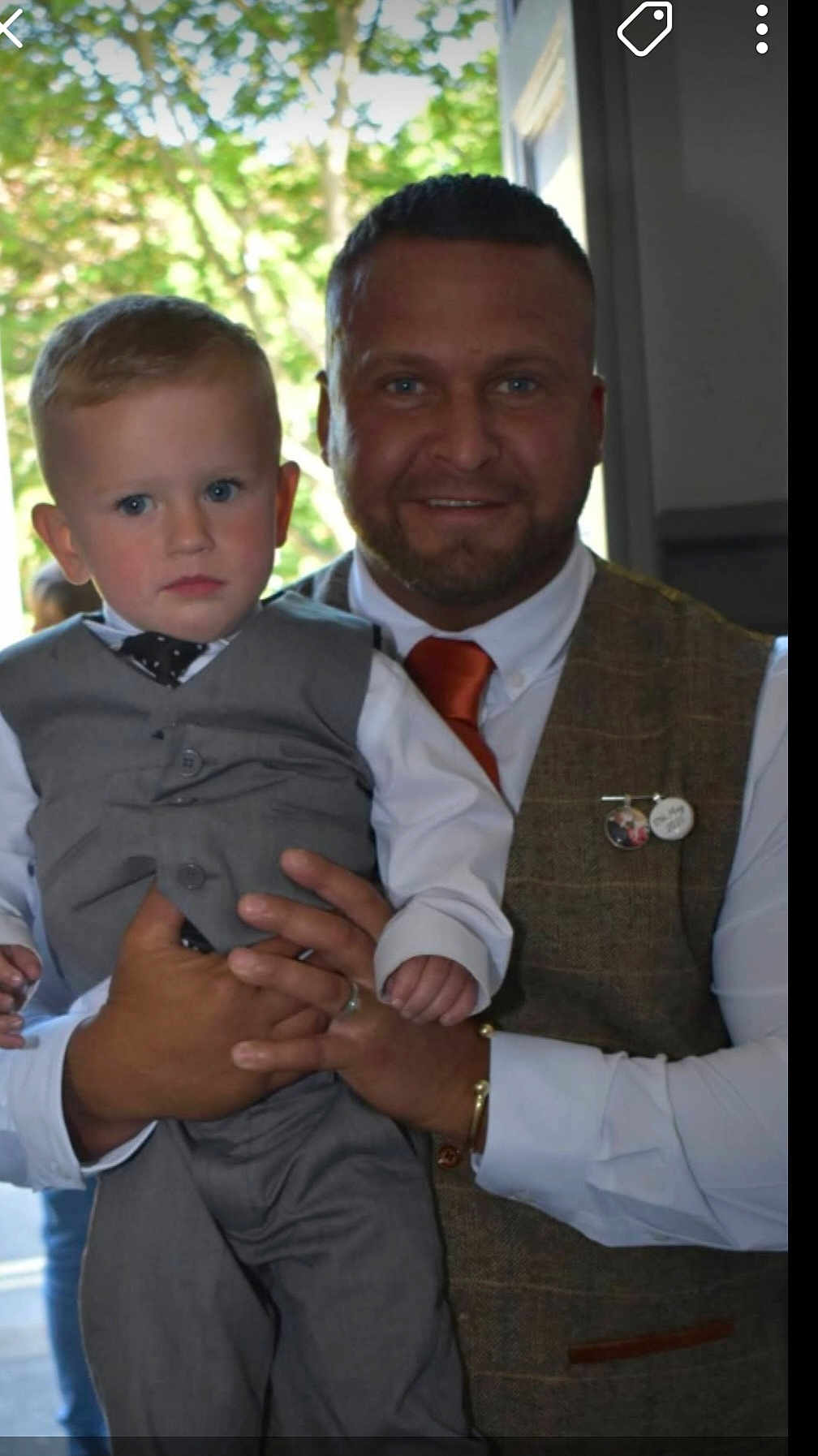 Lincoln joined the competition — help win amazing prizes! child, man, toddler, suit, vest, tie, formal_wear, portrait, indoor, holding, blue_eyes, short_hair, beard, smiling, person, fashion, family, event, closeup, hands
