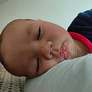 Raphaël a rejoint le concours — aidez-le/la à gagner de superbes lots ! baby, baby_sleeping, baby_toddler_clothing, cheek, comfort, eyebrow, eyelash, face, finger, forehead, headgear, iris, lip, mammal, mouth, neck, nose, skin, sleeve, vertebrate