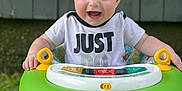 Saint joined the competition — help win amazing prizes! baby, backyard, chair, clothing, face, furniture, grass, happy, head, lawn, nature, outdoors, person, photography, plant, portrait, pottedplant, summer, t_shirt, yard