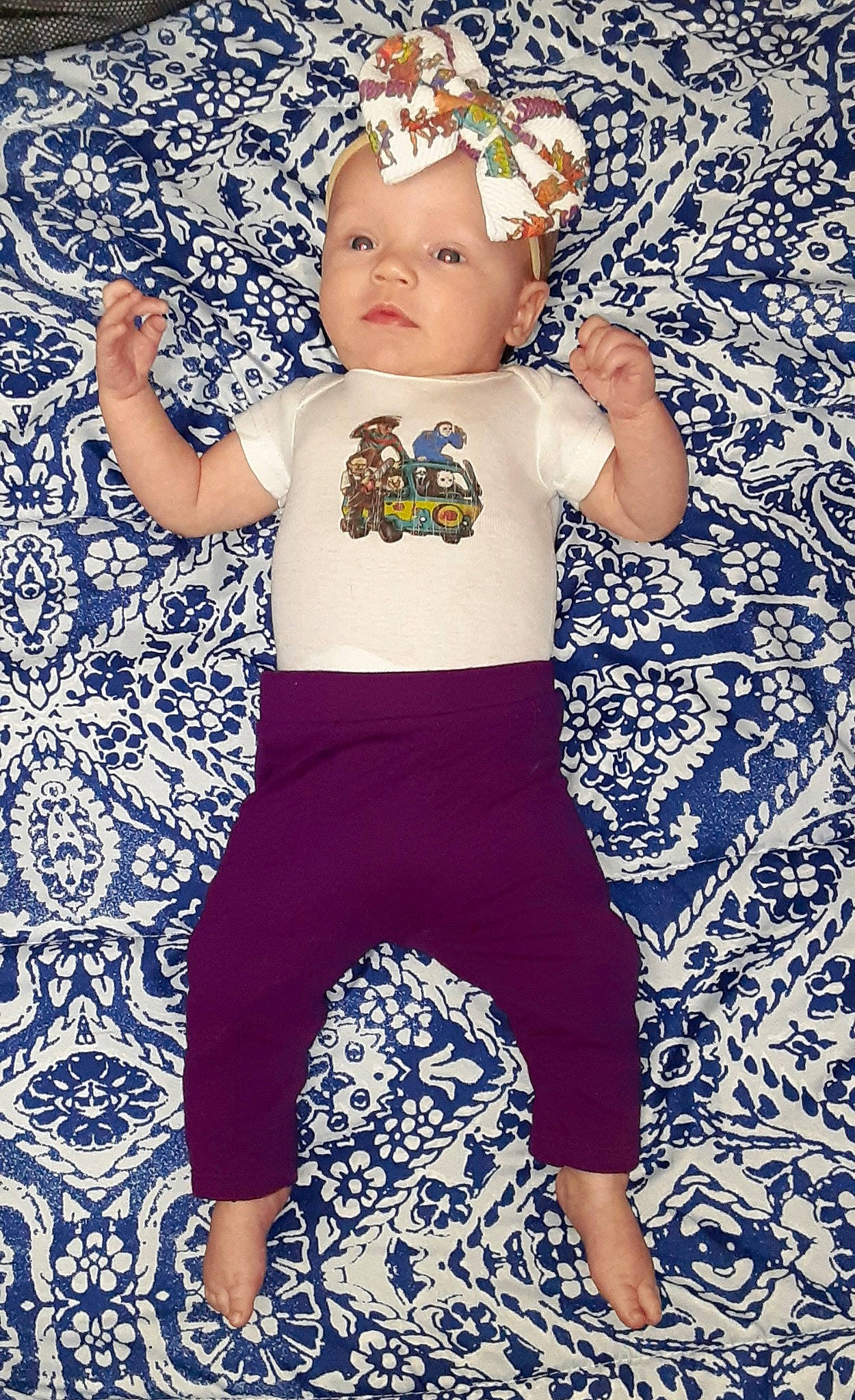 Annaleigh is registered to the contest to win money with this photo: baby, baby_products, baby_toddler_clothing, child, clothing, design, headwear, pajamas, pattern, person, product, sleeve, smile, toddler