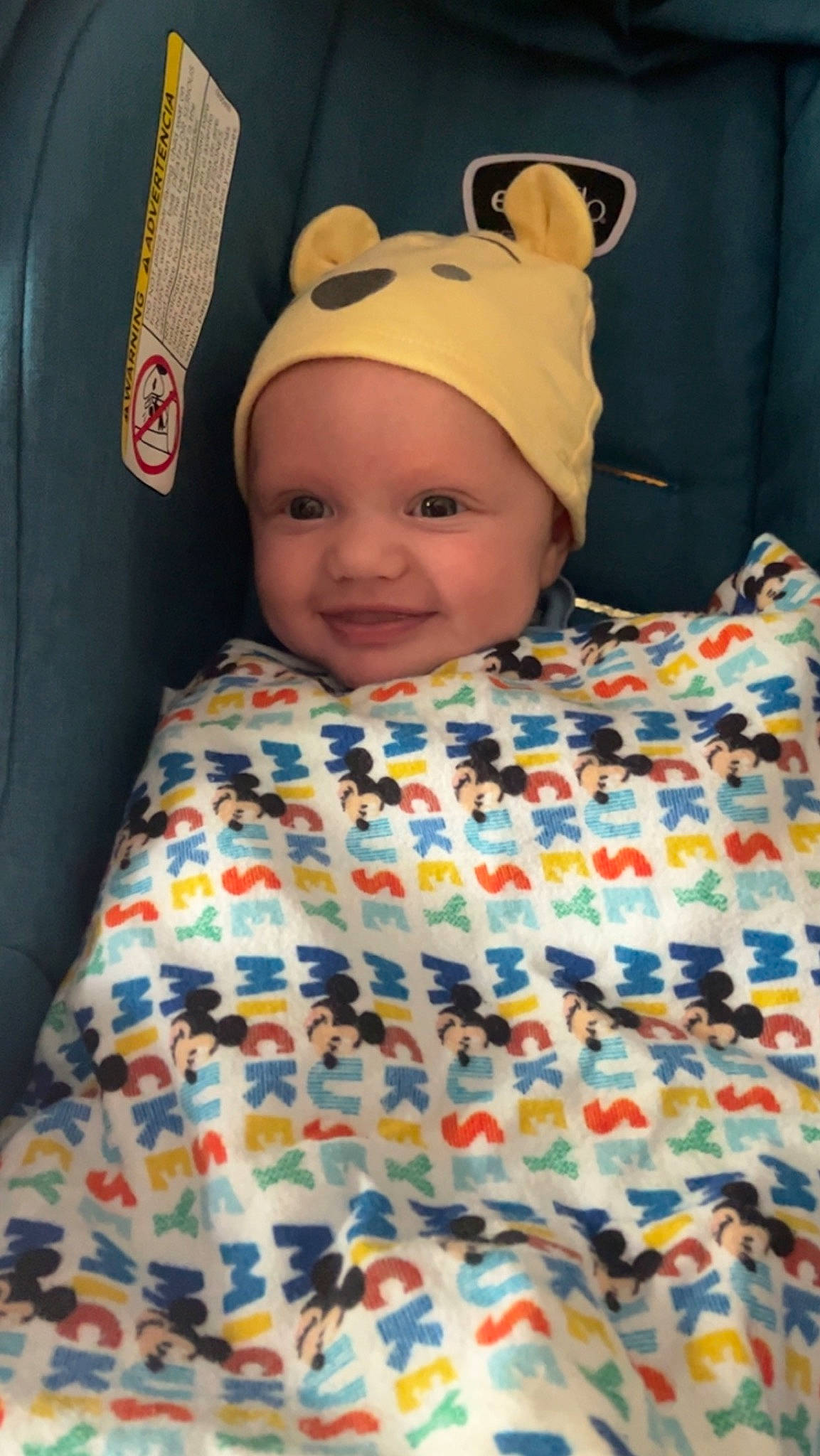 Myles is registered to the contest to win money with this photo: baby, baby_products, baby_toddler_clothing, bedding, cap, child, comfort, costume_hat, design, fun, happy, head, headwear, joy, linens, pattern, person, product, room, sleeve