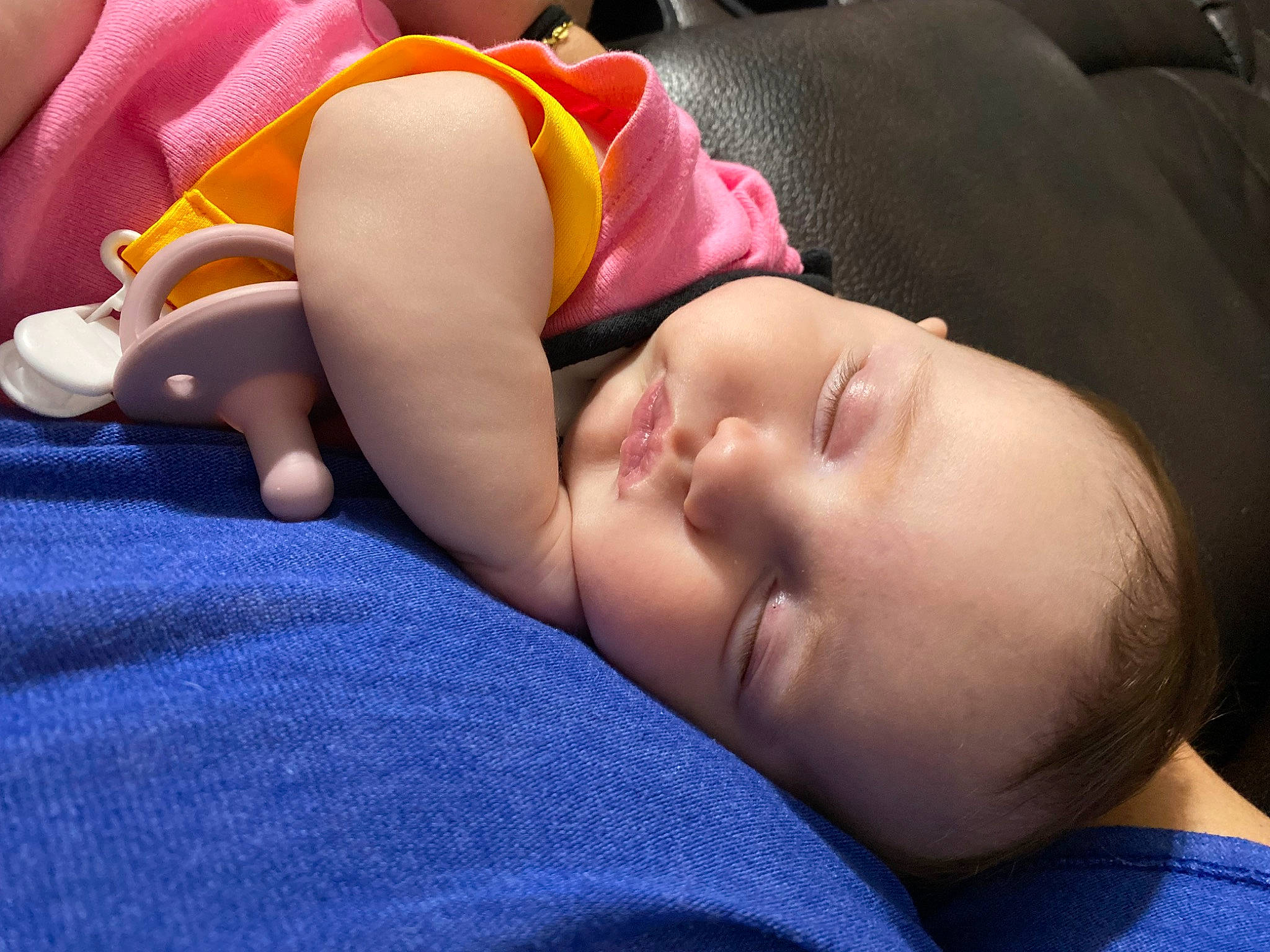 Hailey joined the competition — help win amazing prizes! abdomen, audio_equipment, baby, bedtime, chest, child, comfort, electric_blue, fun, human_body, human_leg, mouth, nap, neck, nose, person, personal_protective_equipment, sitting, skin, thigh