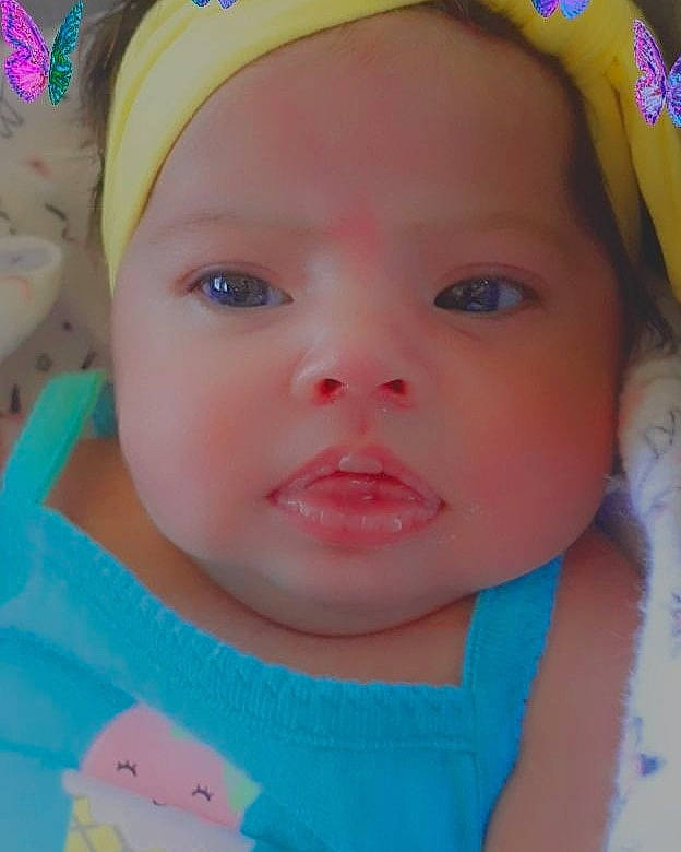 Shyla joined the competition — help win amazing prizes! baby, baby_products, baby_toddler_clothing, cap, cheek, child, chin, close_up, eyelash, forehead, hair_accessory, headgear, iris, lip, mouth, nose, organ, person, skin, toddler