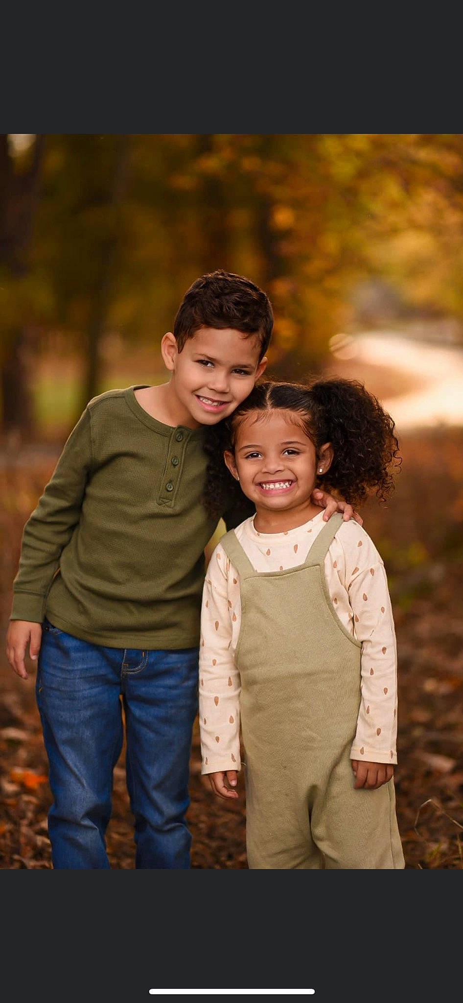 Jacelyn joined the competition — help win amazing prizes! child, clothing, event, flash_photography, formal_wear, fun, gesture, grass, happy, joy, laugh, love, outerwear, people_in_nature, person, portrait_photography, sitting, smile, toddler, tradition