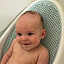 Atticus is registered to the contest to win money with this photo: baby, child, smiling, bath, bathroom, water, wet_hair, skin, seat, baby_bath, portrait, infant, childhood, cute, happy, person, tub, plastic, relaxing, sitting