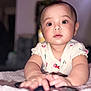 Kailani is registered to the contest to win money with this photo: arm, baby, bed, bedroom, bodypart, crawling, face, finger, furniture, hand, happy, head, indoors, newborn, person, photography, portrait, room, sitting, smile