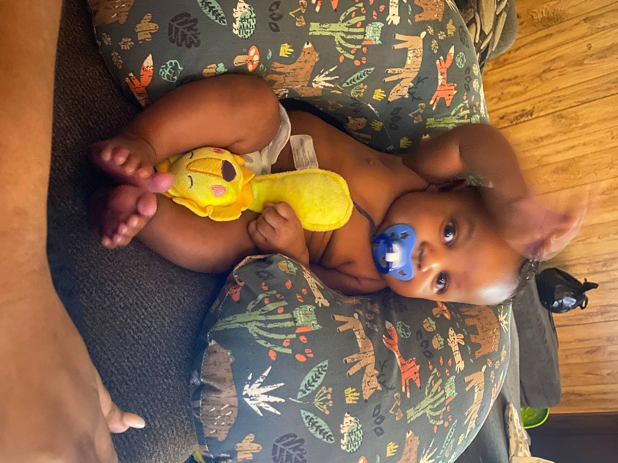 Ashton is registered to the contest to win money with this photo: abdomen, baby, chest, child, elbow, finger, fun, happy, hat, human_leg, joint, leg, nail, person, skin, sunglasses, thigh, toddler, toy, trunk