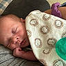 baby, newborn, sleeping, blanket, hedgehog_pattern, pacifier, infant, face, hand, cozy, resting, cute, soft, person, child, comfort, peaceful, closeup, indoors, nap