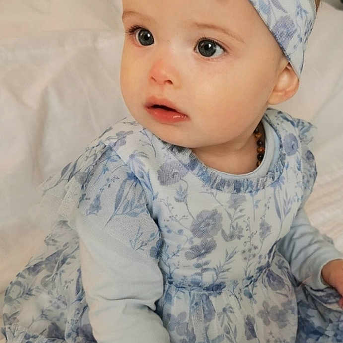 Eden-Ruth joined the competition — help win amazing prizes! accessories, baby, bed, bedroom, clothing, cushion, face, furniture, head, headband, homedecor, indoors, pants, people, person, photography, portrait, room, sitting, sleeve